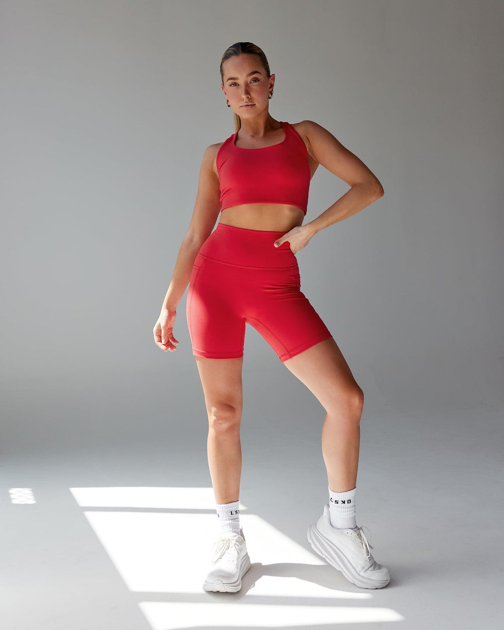 Woman wearing Fusion Mid Short Tight - Scarlet