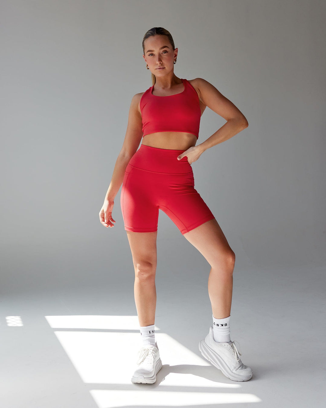 Woman wearing Fusion Mid Short Tight - Scarlet