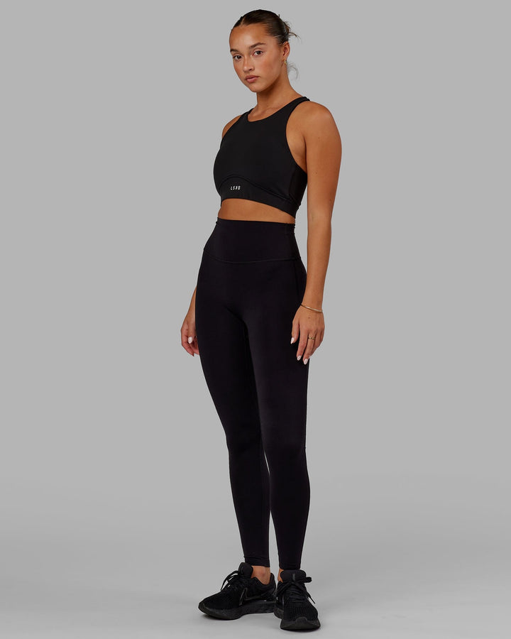 Woman Wearing Fusion Sports Bra - Black
