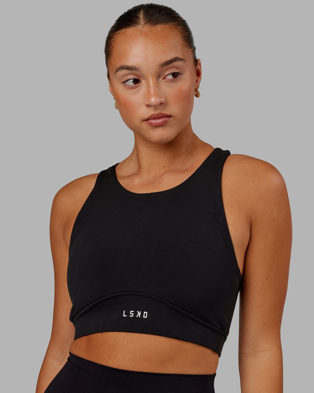 Woman Wearing Fusion Sports Bra - Black