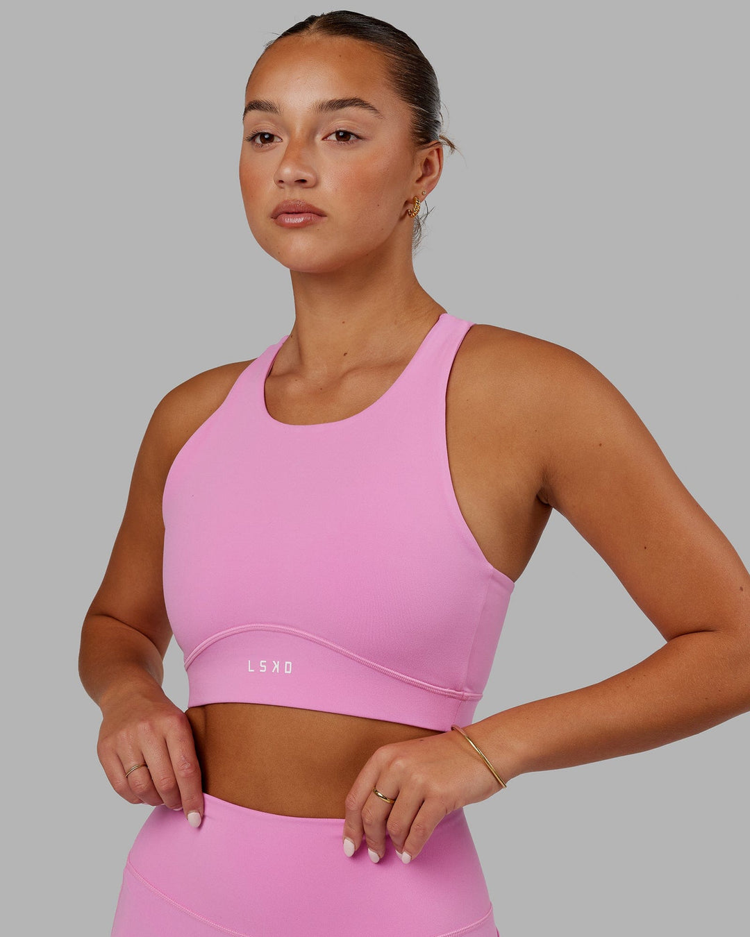 Woman Wearing Fusion Sports Bra - Spark Pink