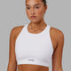 Woman Wearing Fusion Sports Bra - White