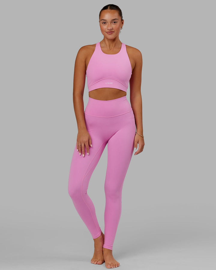 Woman wearing Fusion X-long Tight - Spark Pink