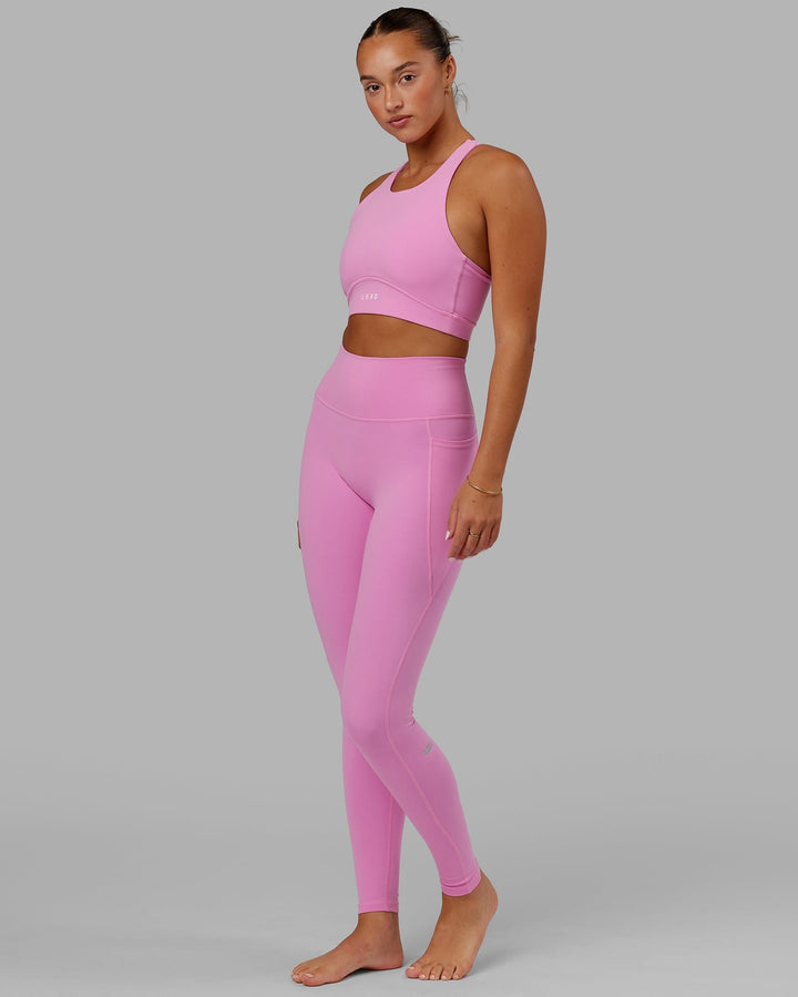 Woman wearing Fusion X-long Tight - Spark Pink
