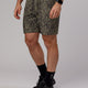 Man wearing Hunter Performance Short - Laurel Oak-Black