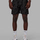 Man wearing Intensity 7'' Performance Short - Black Tie Dye