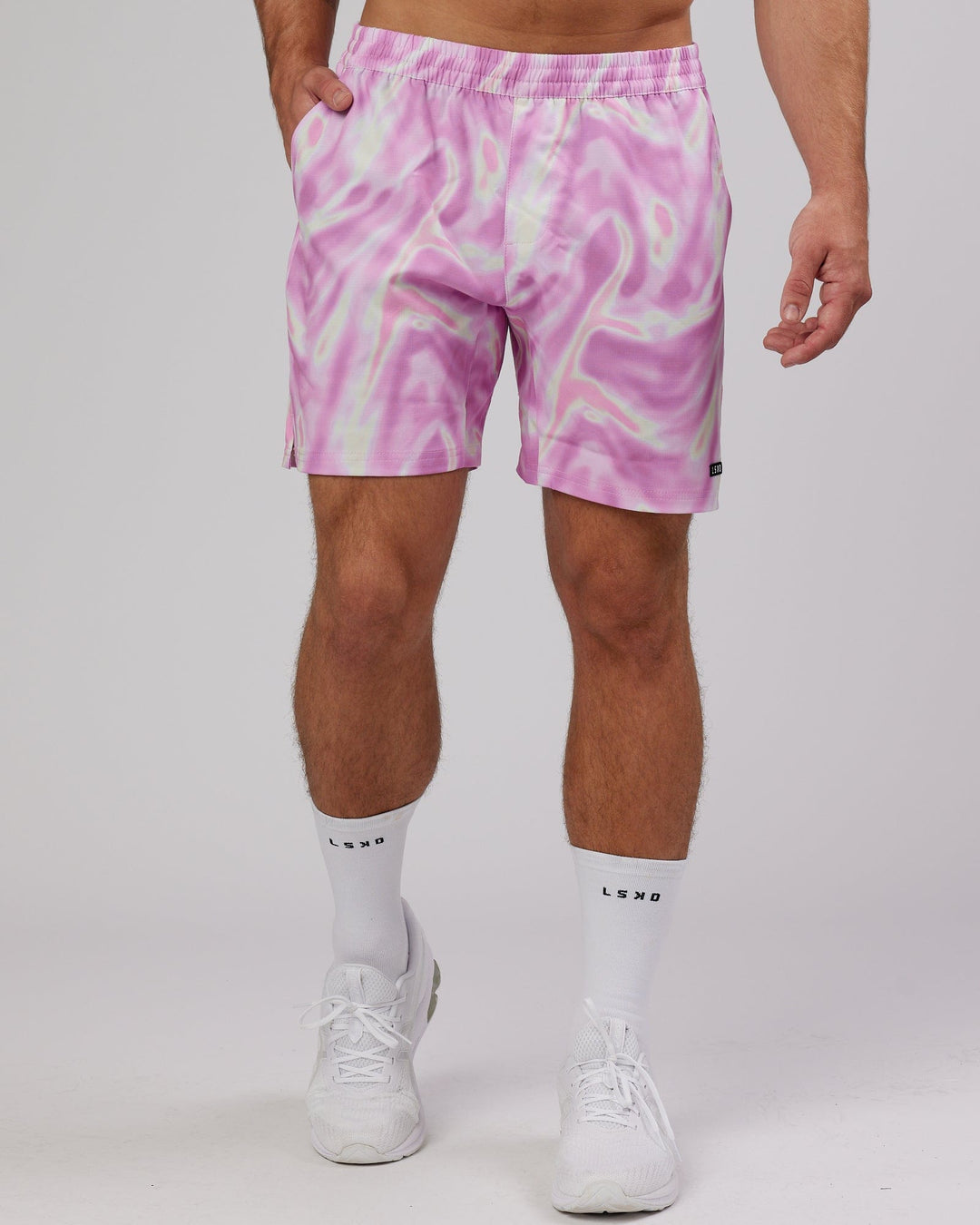 Man wearing Intensity 7" Performance Ripstop Short - Euphoria-Pink