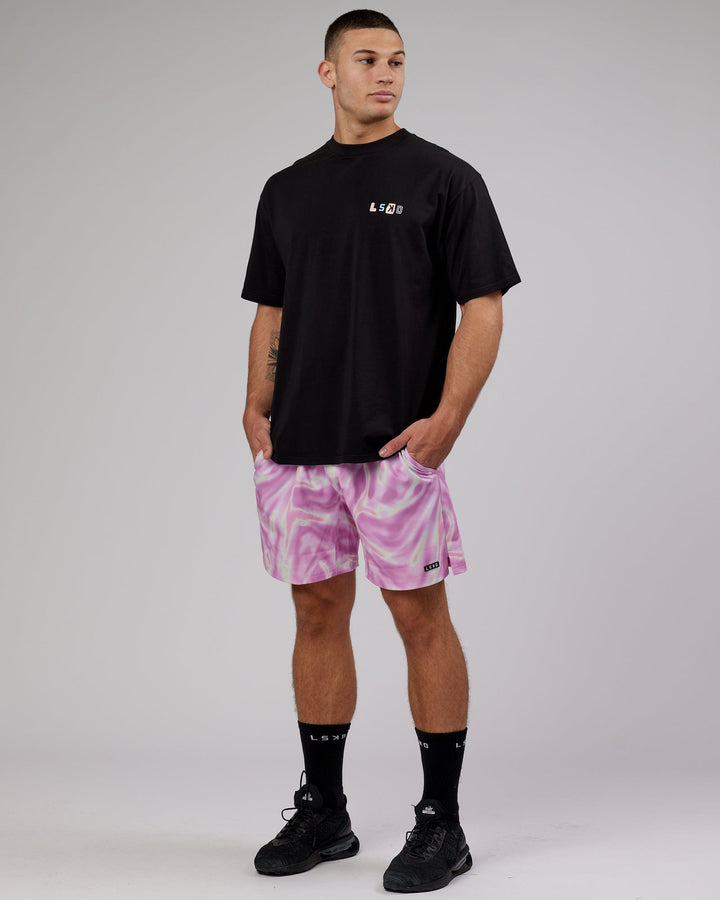 Man wearing Intensity 7" Performance Ripstop Short - Euphoria-Pink