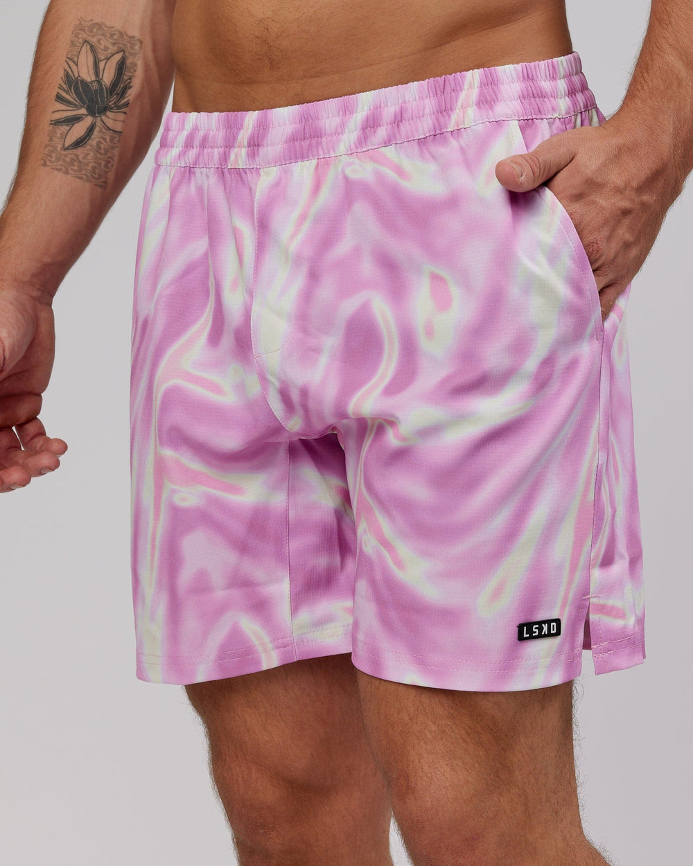Man wearing Intensity 7" Performance Ripstop Short - Euphoria-Pink