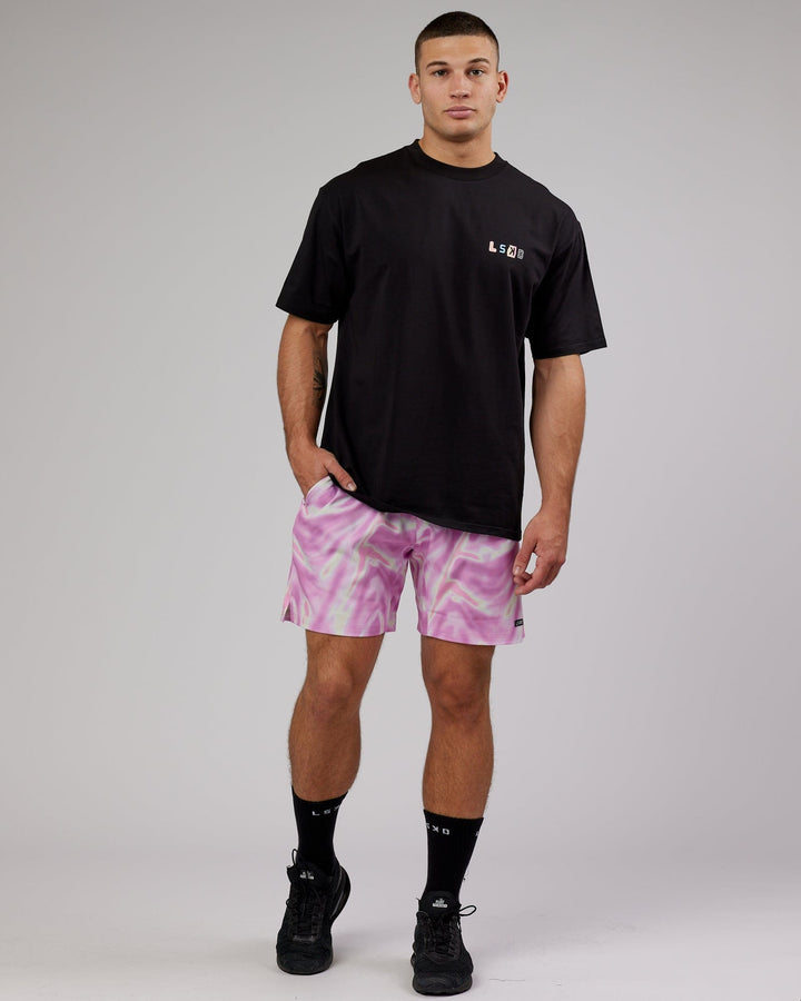 Man wearing Intensity 7" Performance Ripstop Short - Euphoria-Pink