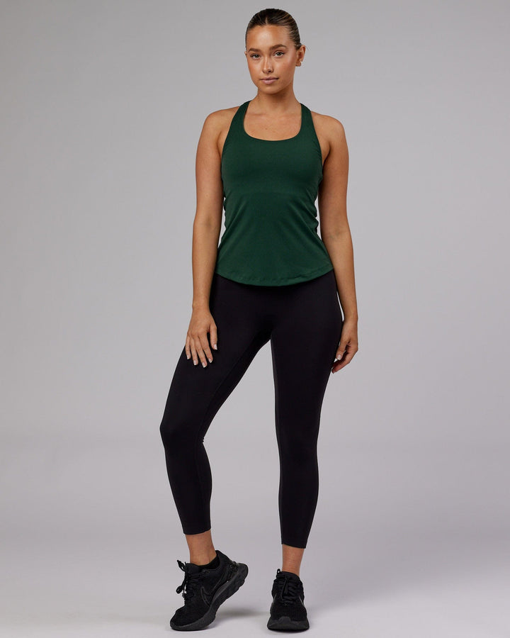 Woman wearing Lift Performance Tank - Vital Green