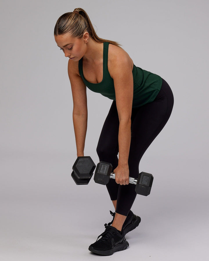 Woman wearing Lift Performance Tank - Vital Green