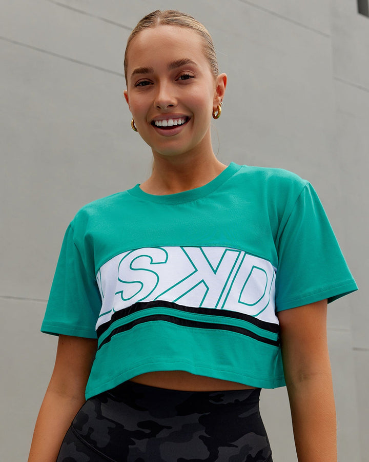 Woman wearing Line-Up Cropped Tee - White-Hyper Teal