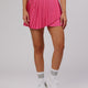 Woman wearing Match Point Skirt - Flamingo