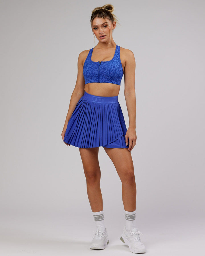 Woman wearing Match Point Skirt - Power Cobalt