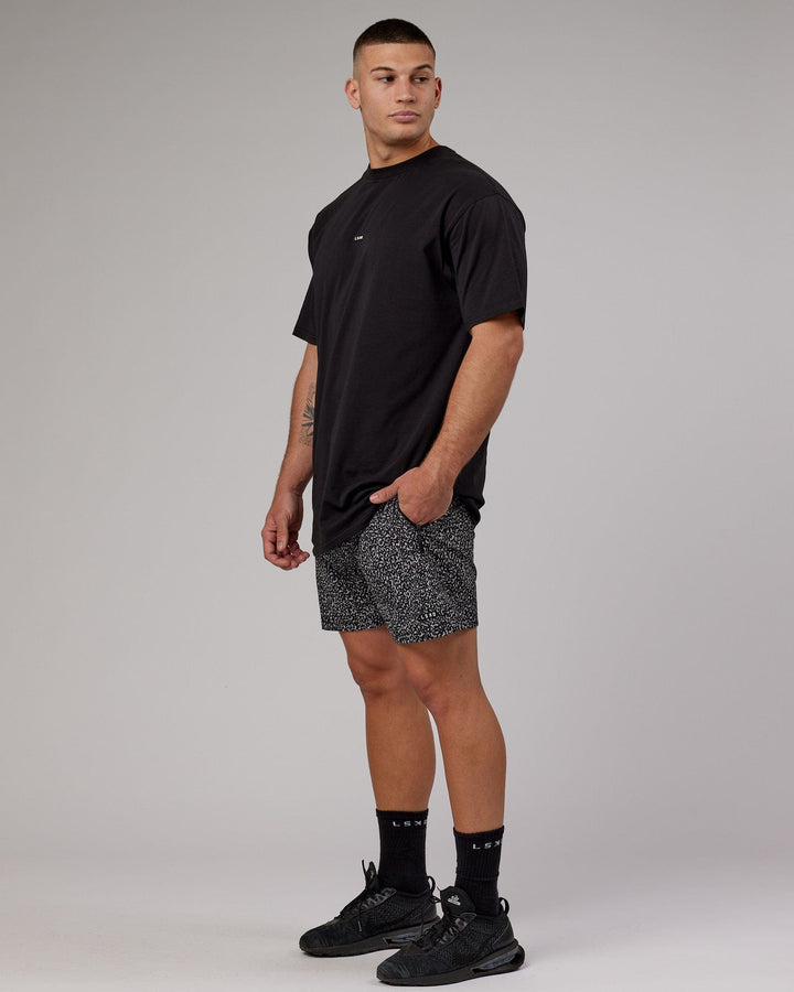Man wearing Fundamental FLXCotton Tee Longline Oversize - Black