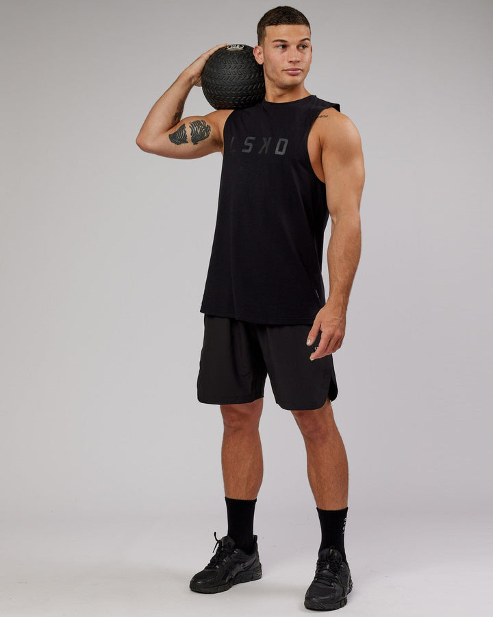 Man wearing Competition 8" Performance Short - Black