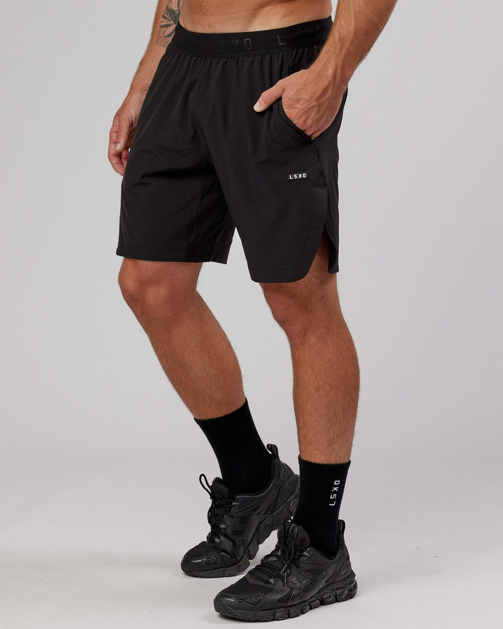 Man wearing Competition 8" Performance Short - Black