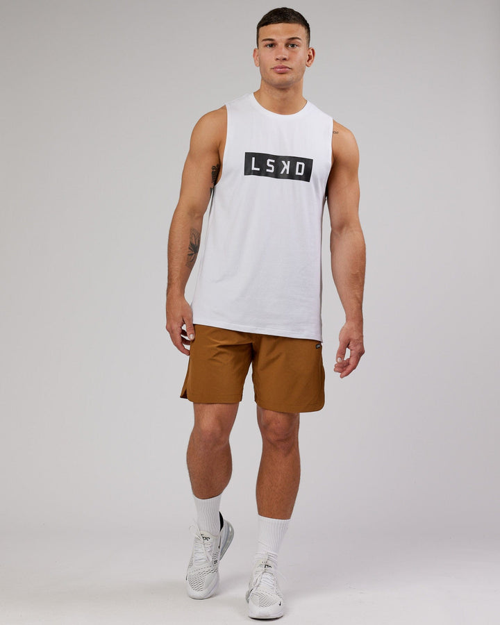 Man wearing Competition 8" Performance Short - Camel
