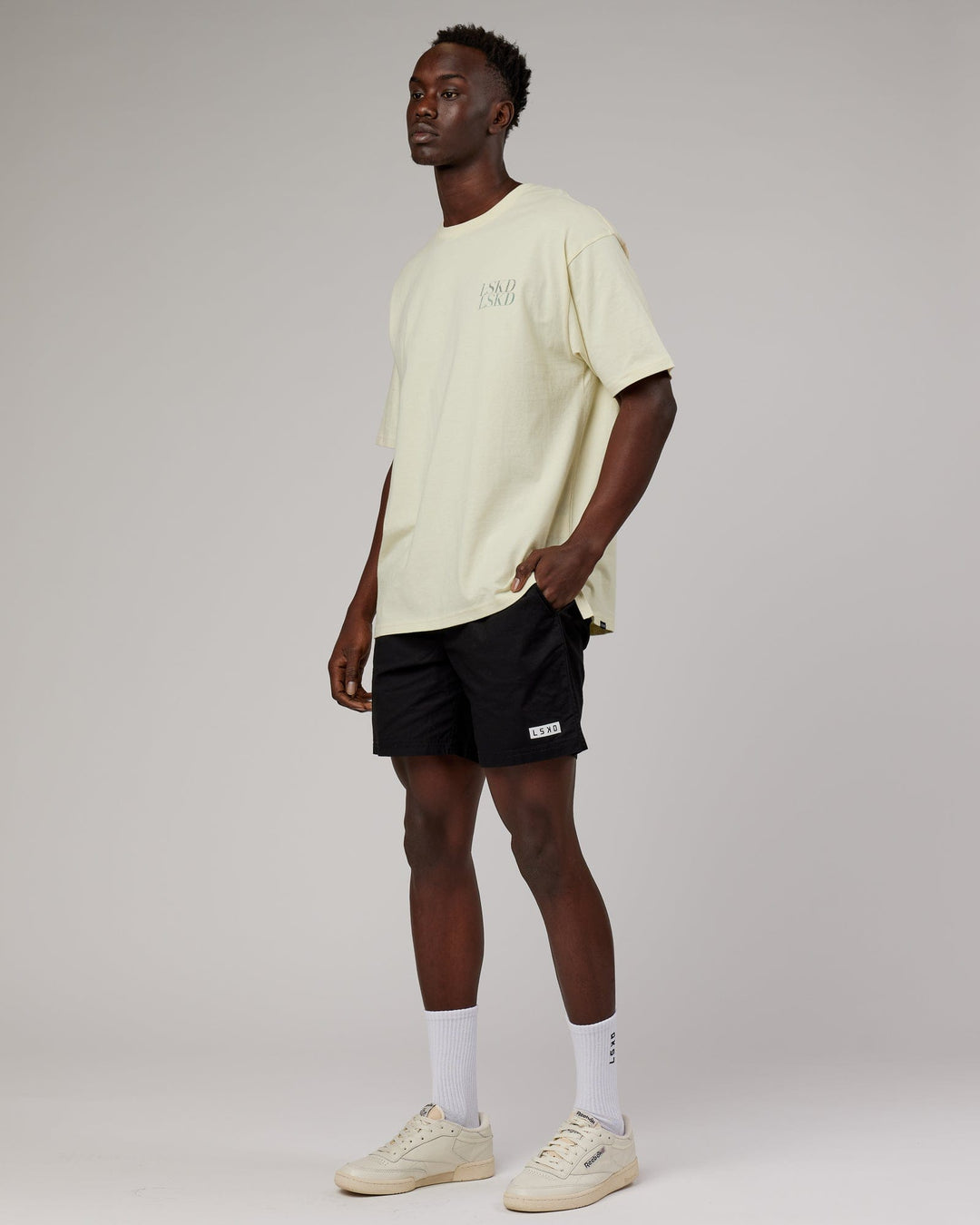 Man wearing Unisex Aurora Oversize Tee - Almond Milk