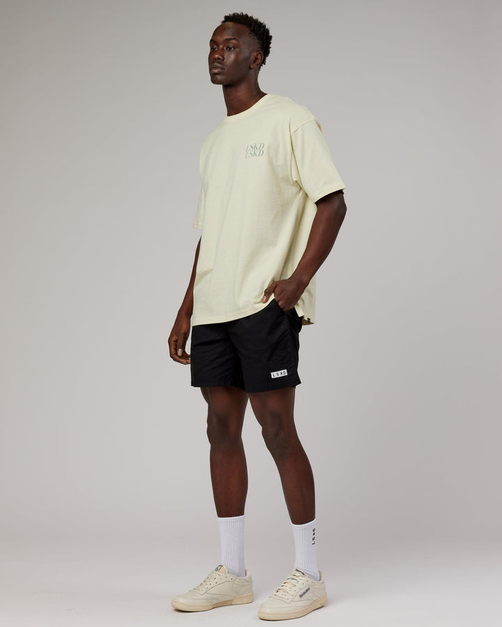 Man wearing Unisex Aurora Oversize Tee - Almond Milk