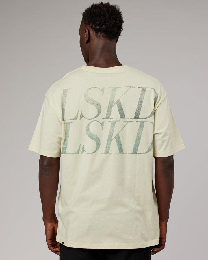 Man wearing Unisex Aurora Oversize Tee - Almond Milk