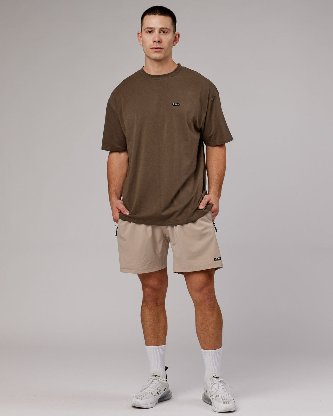  Man wearing Unisex Capsule FLXCotton Tee Oversize - Army Green