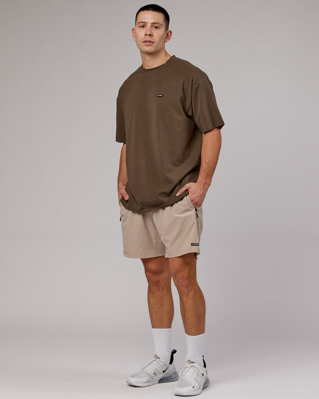 Man wearing Unisex Capsule FLXCotton Tee Oversize - Army Green