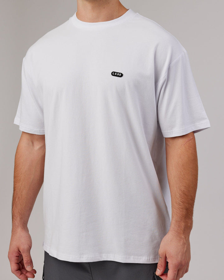 Man wearing Unisex Capsule FLXCotton Tee Oversize - White