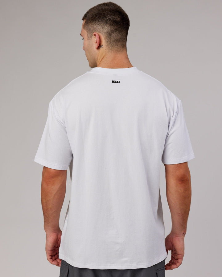 Man wearing Unisex Capsule FLXCotton Tee Oversize - White