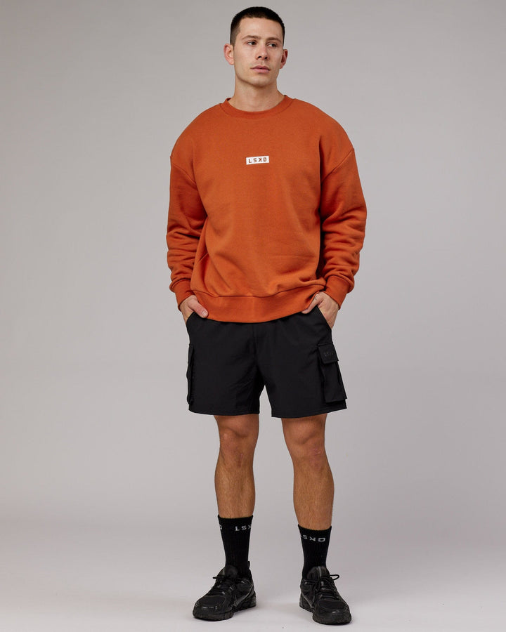 Man wearing Unisex Cornerstone Sweater Oversize - Auburn