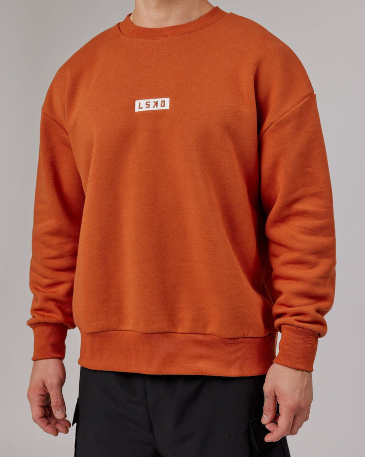 Man wearing Unisex Cornerstone Sweater Oversize - Auburn