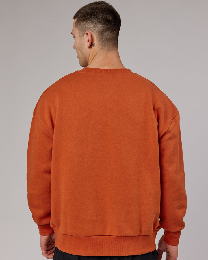 Man wearing Unisex Cornerstone Sweater Oversize - Auburn
