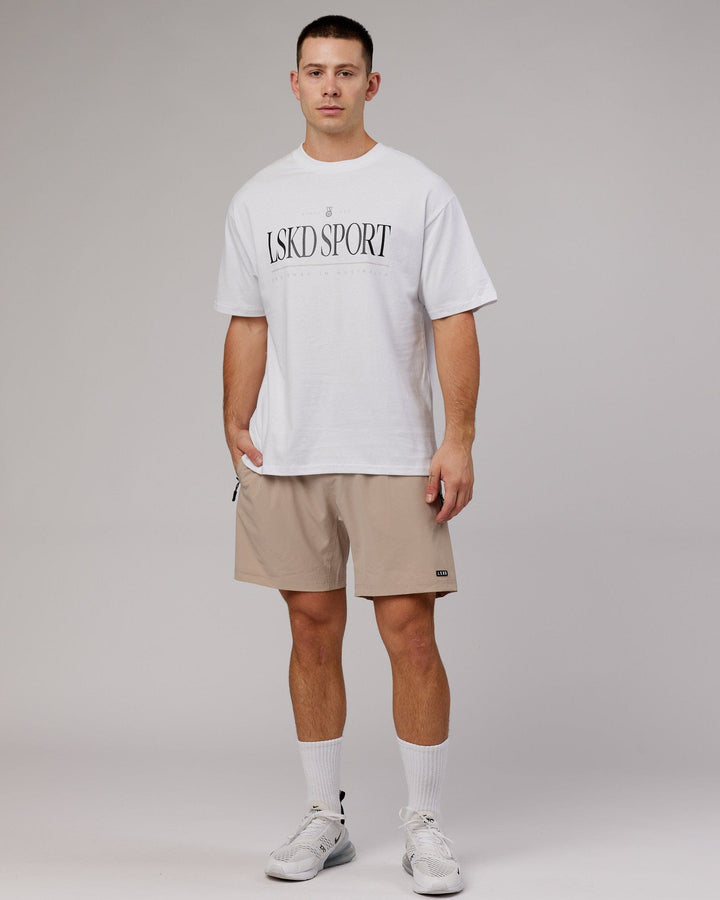 Man wearing Unisex Heritage Heavyweight Tee Oversize - White-Black-Oak