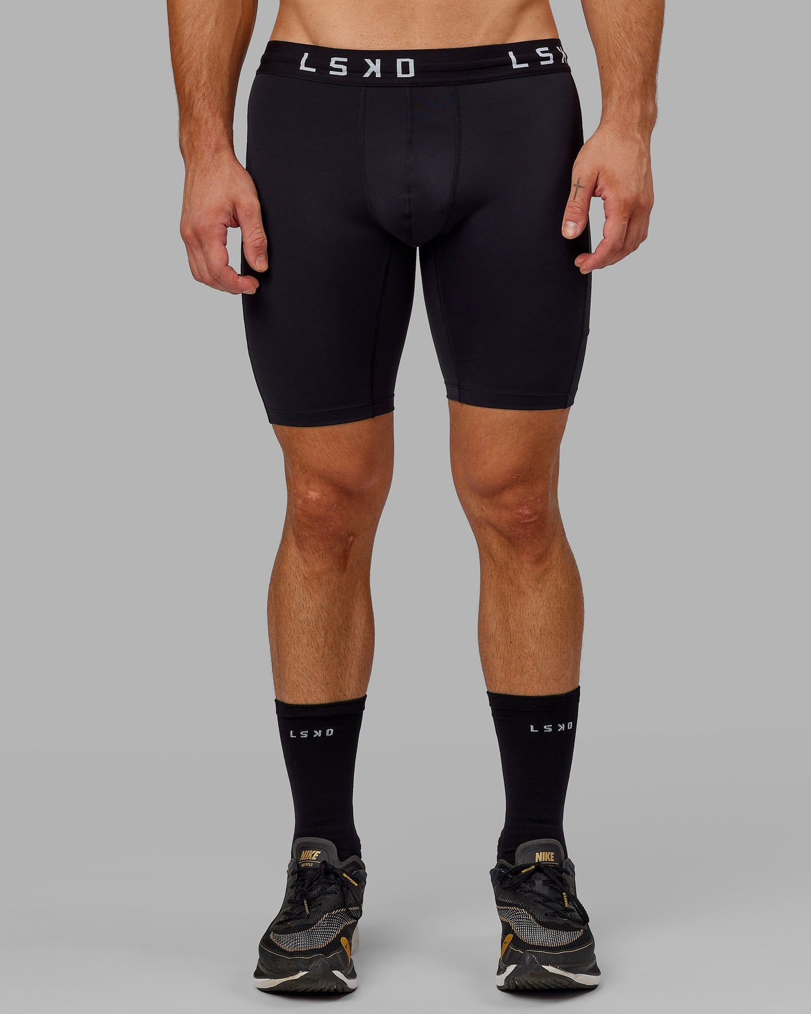 Man wearing Men's Perform Short Tight - Black