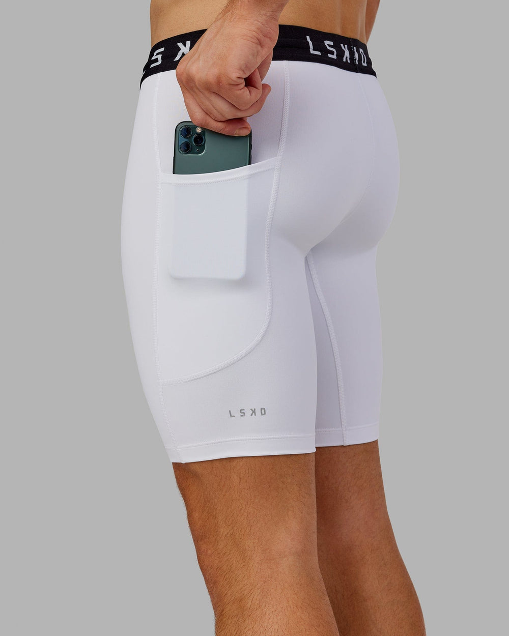 Man wearing Men's Perform Short Tight - White
