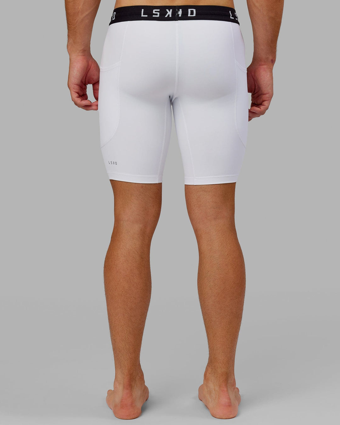 Man wearing Men's Perform Short Tight - White
