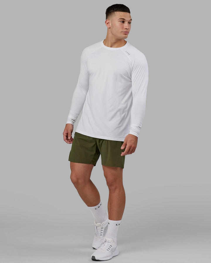 Man wearing Perform VapourFLX LS Tee - White Marl