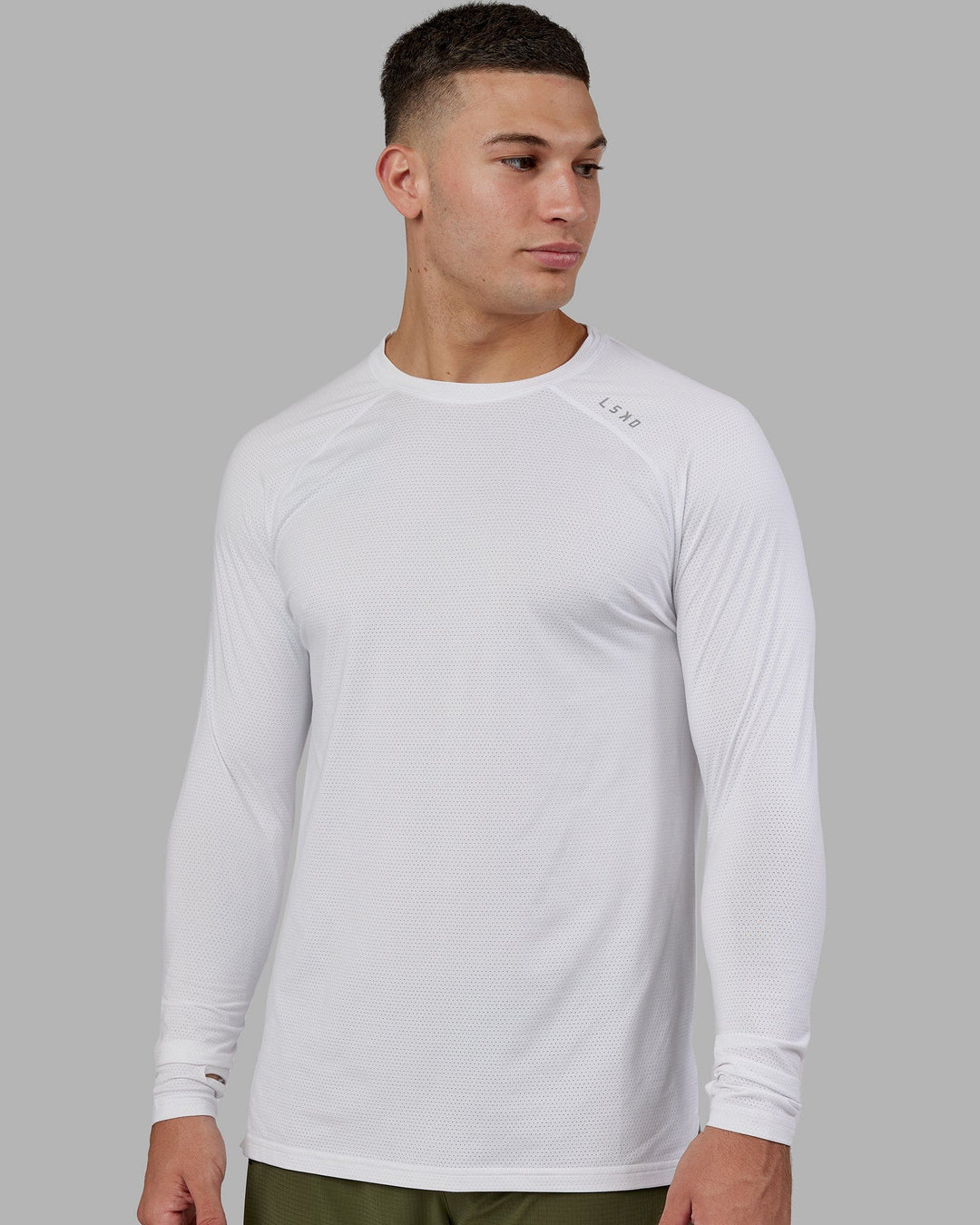 Man wearing Perform VapourFLX LS Tee - White Marl