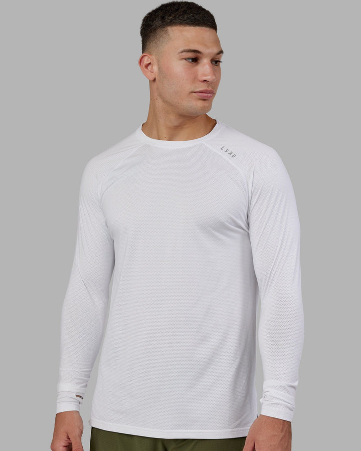 Man wearing Perform VapourFLX LS Tee - White Marl