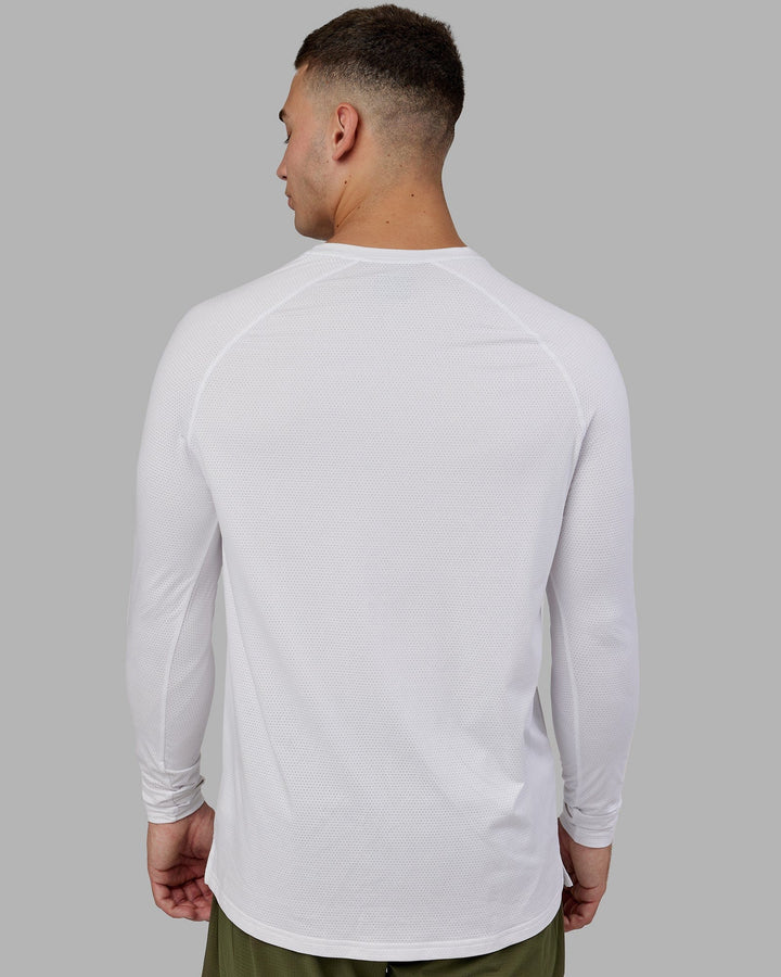Man wearing Perform VapourFLX LS Tee - White Marl