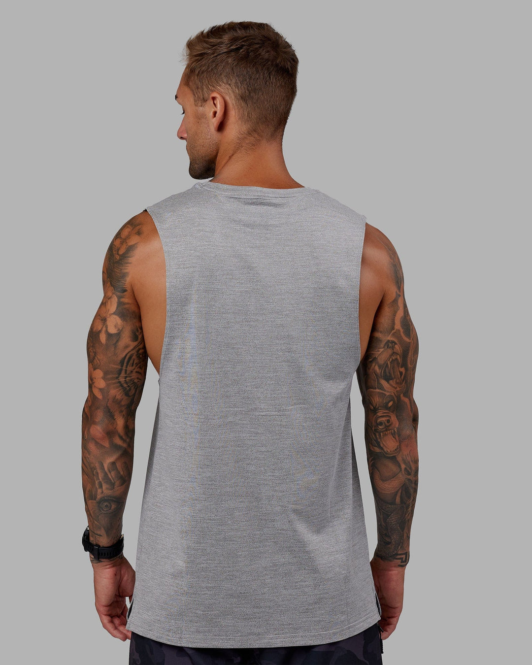 Man wearing Perform VapourFLX Muscle Tank - Light Grey Marl