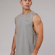 Man wearing Perform VapourFLX Muscle Tank - Light Grey Marl