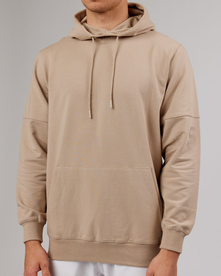 Man wearing Unisex Perimeter FLXFleece Hoodie - Taupe