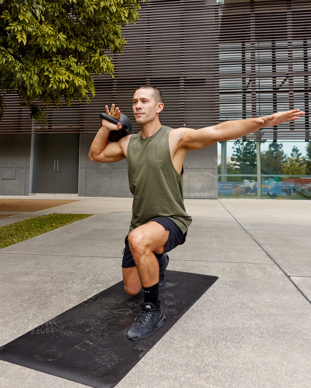 Man wearing PimaFLX Tank - Olive Fade