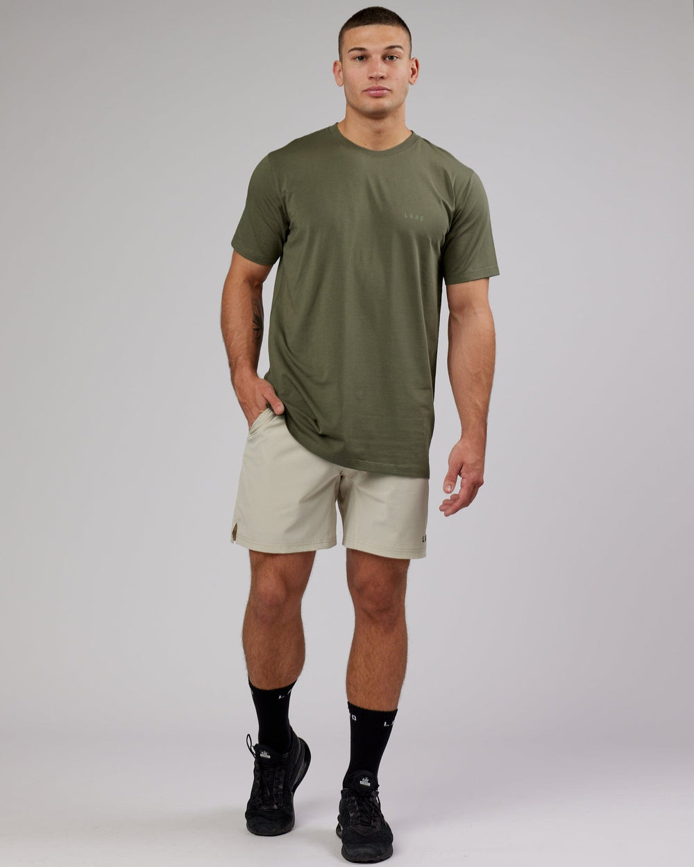 Man wearing PimaFLX Tee - Olive Fade