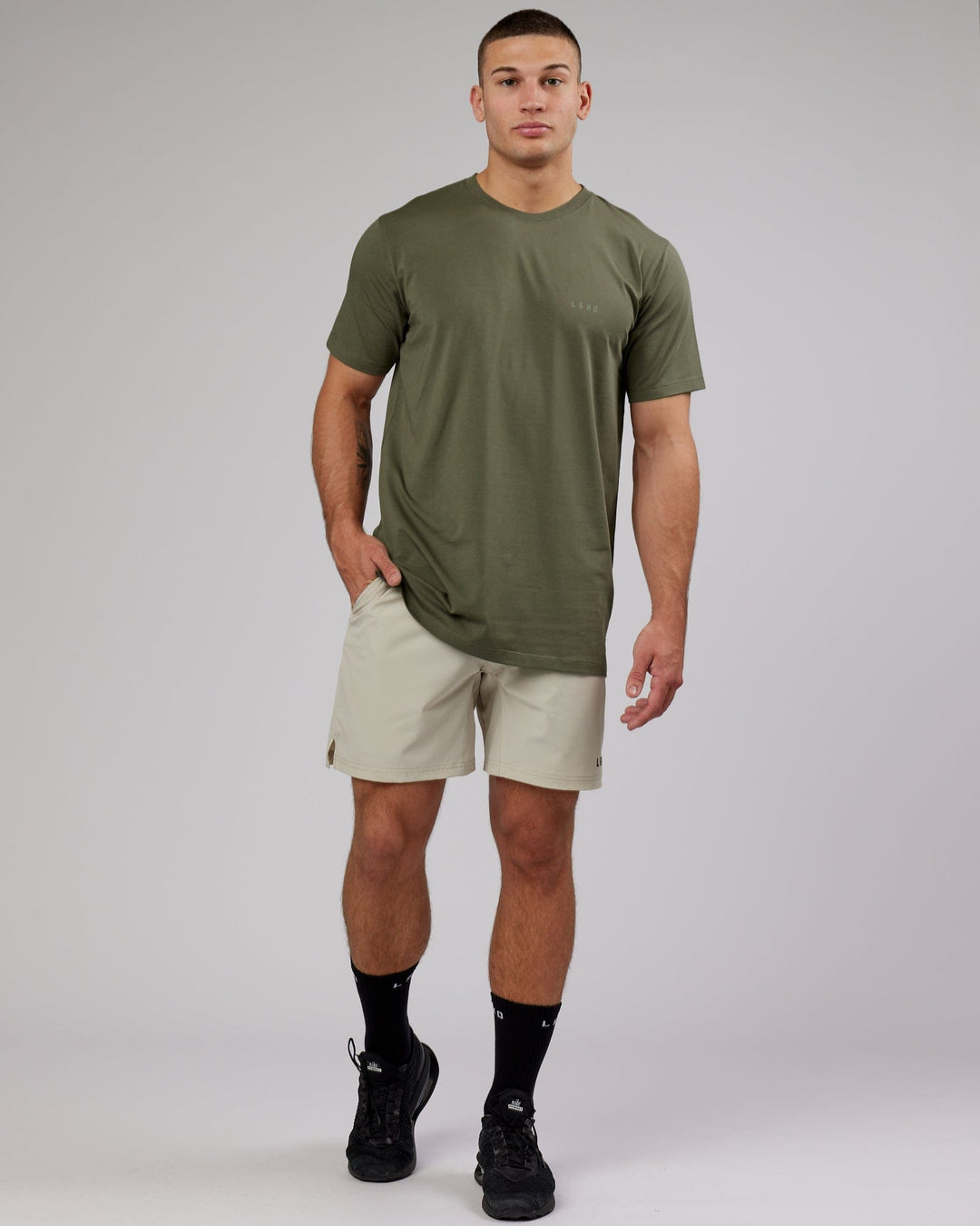 Man wearing PimaFLX Tee - Olive Fade