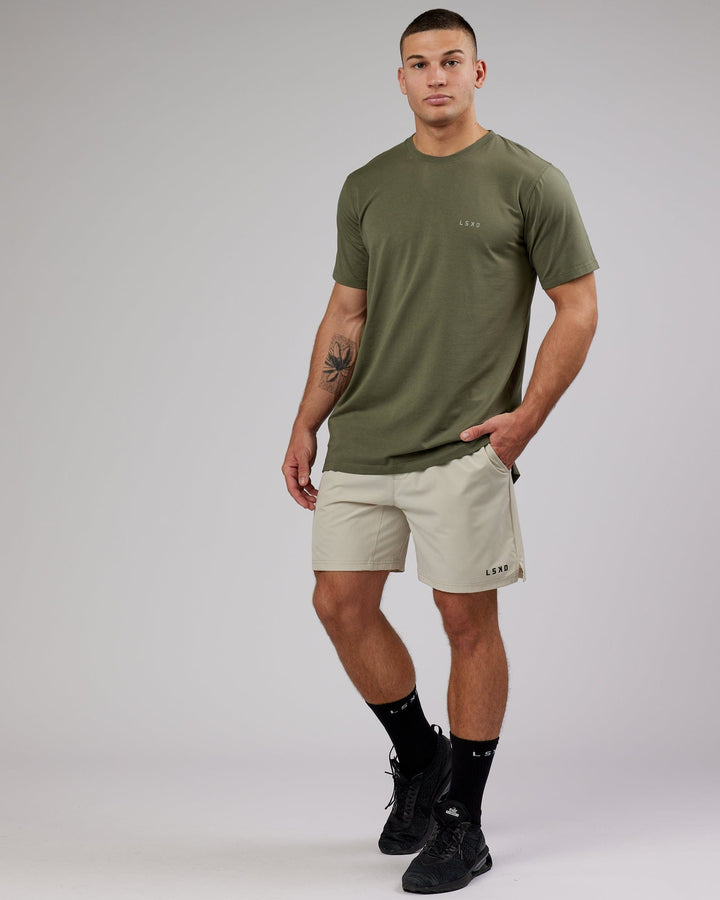 Man wearing PimaFLX Tee - Olive Fade