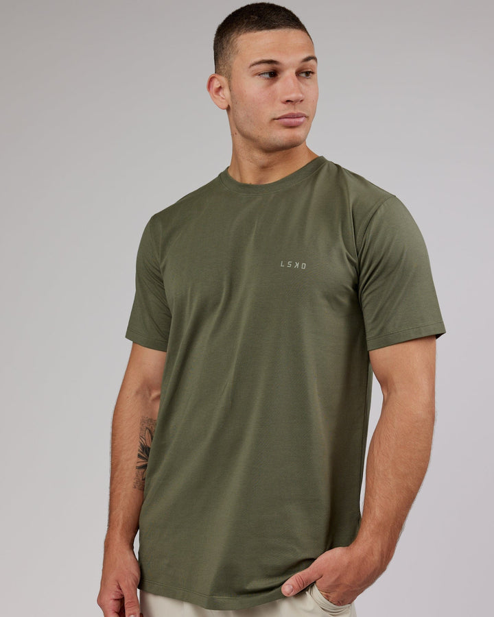 Man wearing PimaFLX Tee - Olive Fade