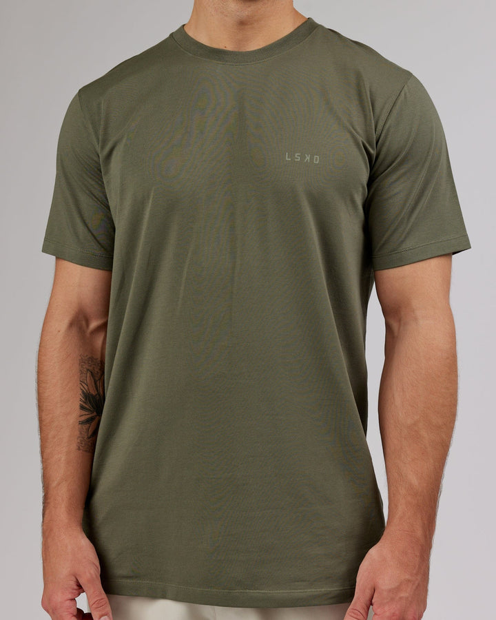 Man wearing PimaFLX Tee - Olive Fade